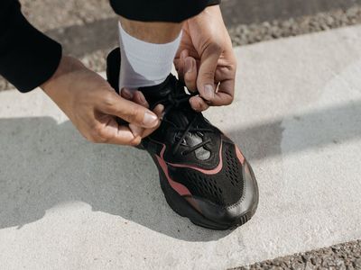 Close up of sports shoes and floor marking for balance